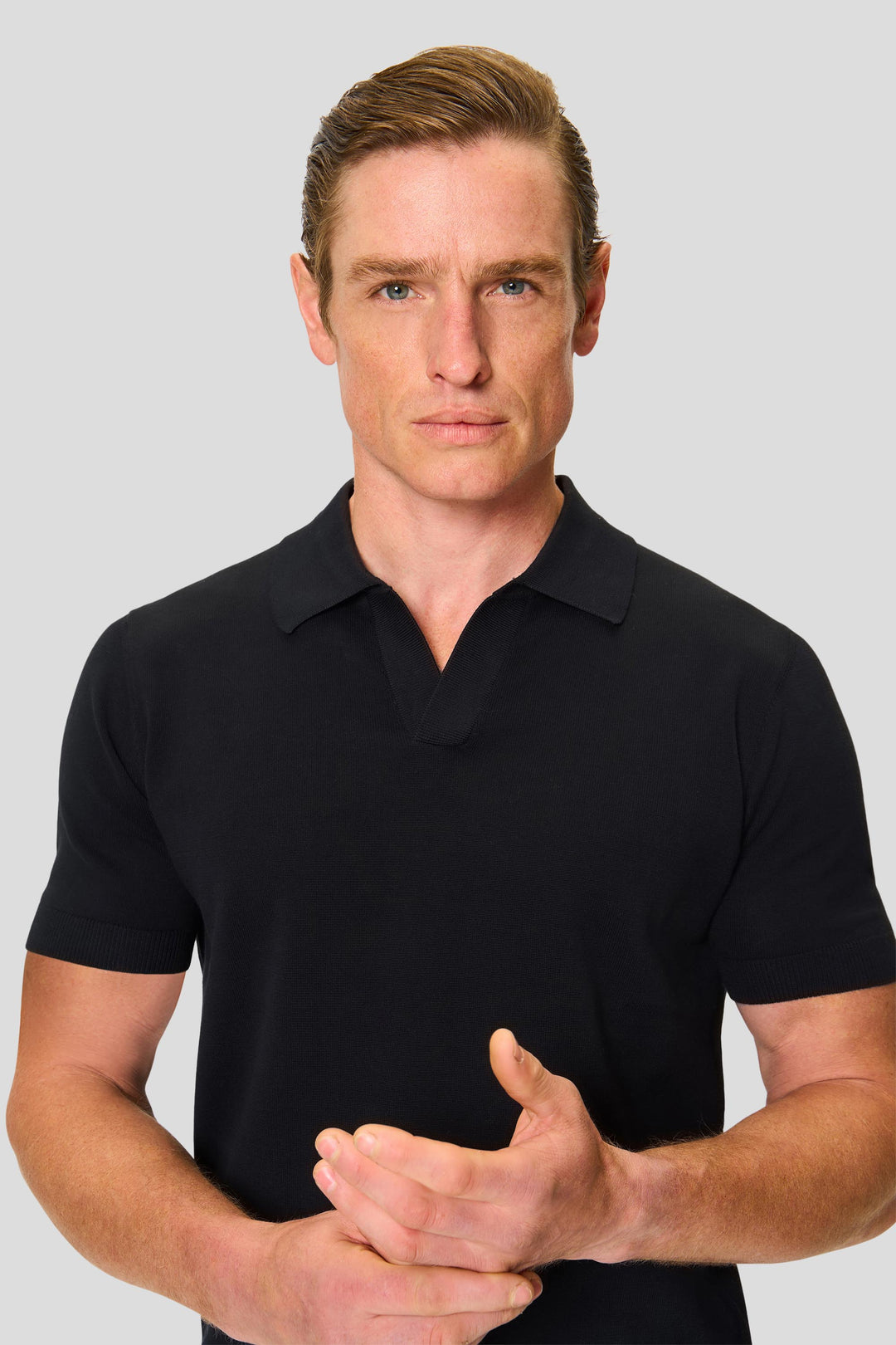 Schwarzes Kurzarm-Poloshirt