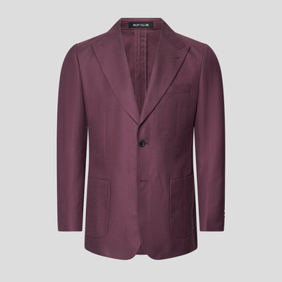 Bordeaux blazer med diskret struktur, klassisk revers og påsyede lommer fra SUIT CLUB